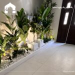 ركن مع نافورة من الجي ار سي والنبات الصناعي
