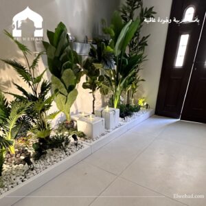 ركن مع نافورة من الجي ار سي والنبات الصناعي