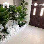 ركن مع نافورة من الجي ار سي والنبات الصناعي